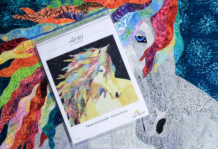 ful horse art quilt with the pattern on top 