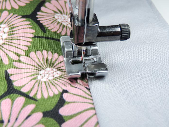 Using a Stitch-in-Ditch Foot to sew on a fabric placemat. PFAFF performance icon, Stitch-in-Ditch Foot, Embroidery/Sensormatic Free-Motion Foot