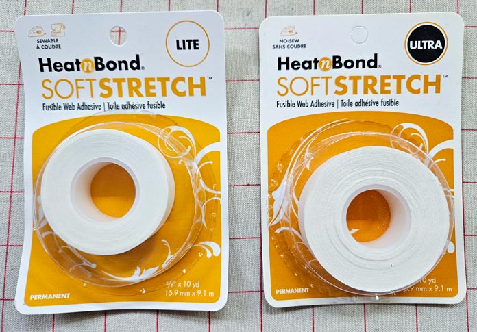 Two gold and white packages of  HeatnBond SoftStretch Lite and Ultra; HeatnBond Hem, HeatnBond SoftStretch Fusible Web, HeatnBond Lite, HeatnBond Feather Lite, HeatnBond Ultrahold, sewing tutorials, quilting tutorials