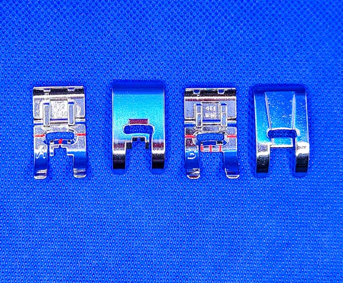 Four metal sewing machine feet