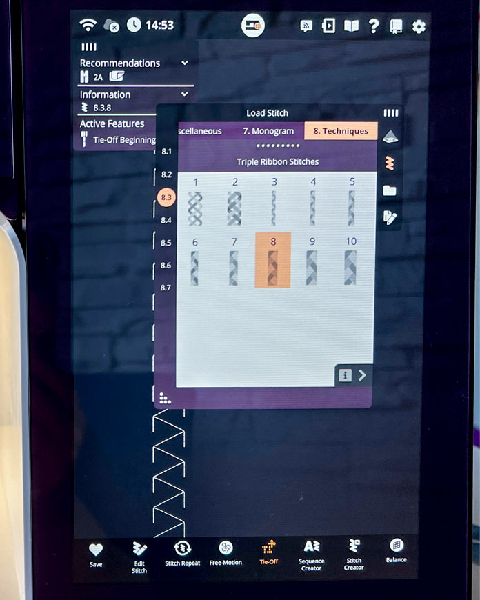 Close-up of the PFAFF creative icon 2 10.1" capacitive screen with Category 8 – Techniques selected under the Load Stitch menu. The Stitch #8 is highlighted from the 8.3 Triple Ribbon Stitches subcategory. The left panel displays the recommended presser foot (2A without IDT), the active stitch (8.3.8), and enabled features including “Needle Down” and “Tie-Off Beginning”. 