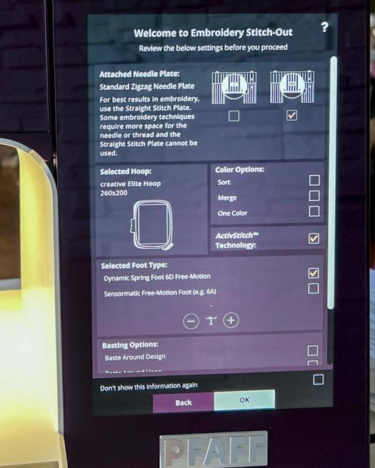 Close-up view of the display screen of the PFAFF creative icon 2 showing the "Welcome to Embroidery Stitch-Out" settings screen. It includes embroidery setup options such as the attached needle plate (Standard Zigzag Needle Plate), selected hoop (creative Elite Hoop 260x200), foot type (Dynamic Spring Foot 6D Free-Motion), and ActivStitch Technology enabled. The user interface provides options for color sorting, basting, and foot pressure adjustments, preparing the machine for embroidery mode. The machine logo “PFAFF” is visible on the front panel below the screen.