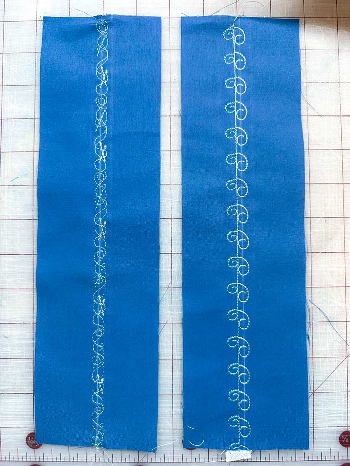 Blue fabric with 2 sets of Stacking Stitches stitch out