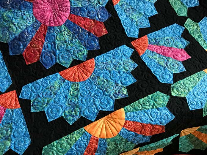Extraordinary quilting details of the Sunburst Quilt pattern by Elaine Theriault for Issue 47; photo by Carla A. Canonico for ANPTmag