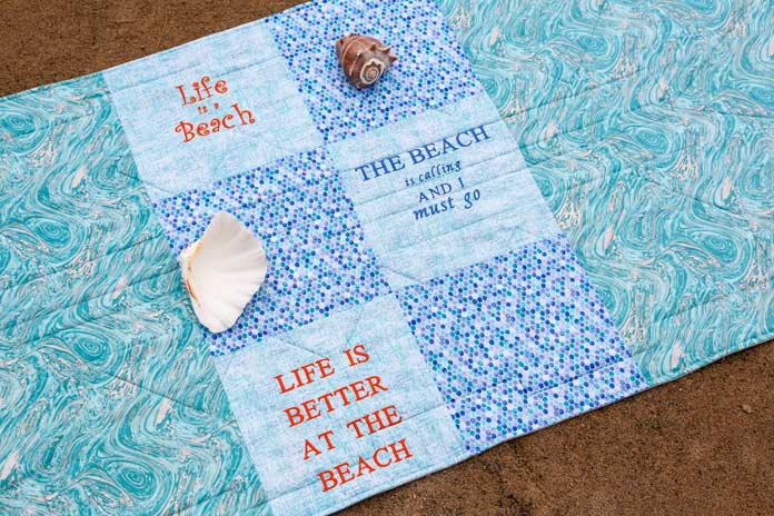 The back side of Life is a Beach Table Runner by Cathy McClean for ANPTmag Issue 53; photo by Carla A. Canonico for ANPTmag