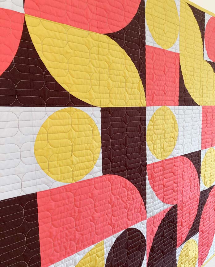 Close up of ’60s Curves Quilt by Monika Henry for ANPTmag Issue 68; photo by Monika Henry for ANPTmag