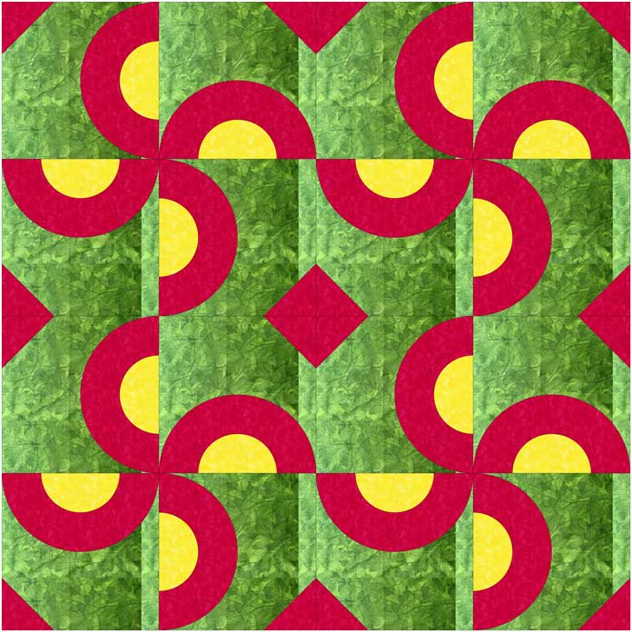 A computerized mockup of a windmill quilt constructed from green, red and yellow half-circle blocks. OLFA Rotary Circle Cutter, OLFA 45mm Splash™ Handle Rotary Cutter, OLFA 45mm Tungsten Tool Steel Rotary Blade, OLFA 12½” Square Frosted Acrylic Ruler, OLFA 6” x 12” Frosted Acrylic Ruler, OLFA 6” x 24” Frosted Acrylic Ruler, OLFA 24” x 36” Double Sided rotary Mat, Heatnbond Non-woven Lightweight Fusible Interfacing, Oliso PRO™ TG1600 Pro Plus Smart Iron