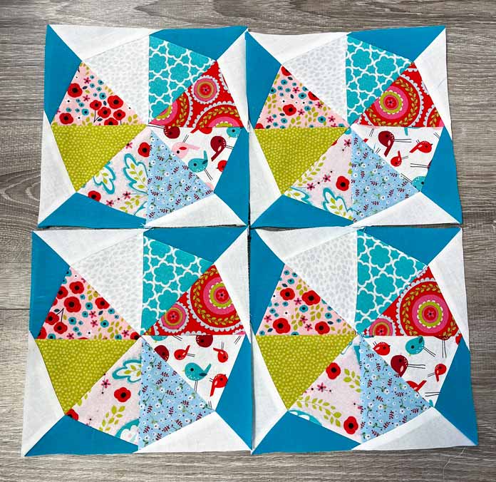 4 of Kaleidoscope Block #2 laid out to show a secondary star pattern