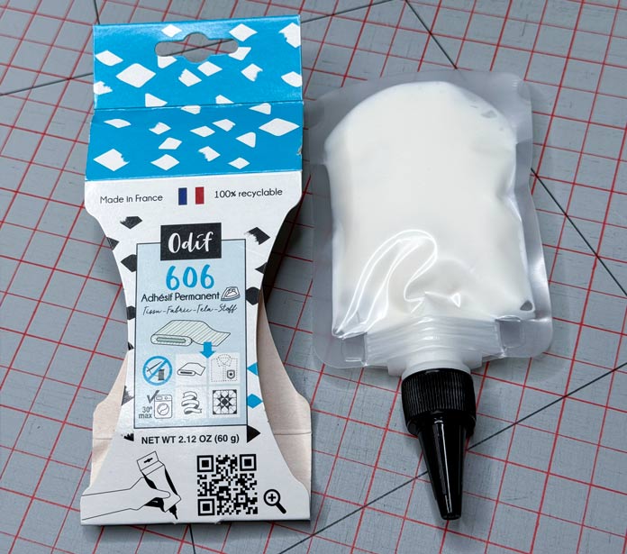 An Odif 606 No-sew Fusible Adhesive Web pouch was removed from its cardboard holder. 