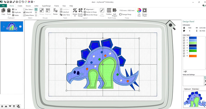 A screenshot of the mySewnet Silver Embroidery Software showing the applique dinosaur design with blue body, dark blue spikes, mint green legs and multi-color polka dots; quilting, embroidery, applique, mySewnet Silver, digital quilting, SINGER MOMENTO 24, PFAFF creative 350, fabric cutting, quilt design, beginner quilting