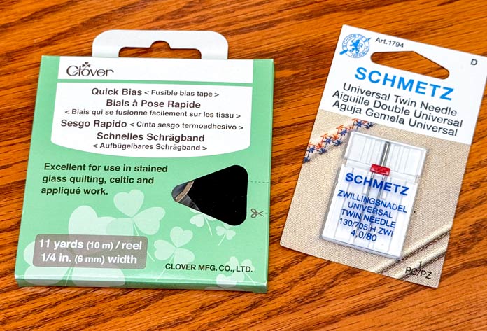 A package of Clover Quick Bias tape and SCHMETZ 4,0/80 twin needle 