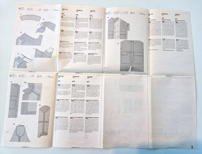 A paper with garment diagrams and writing