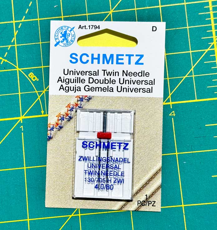 A package of SCHMETZ Twin Needle 80/12 - 4.0mm.