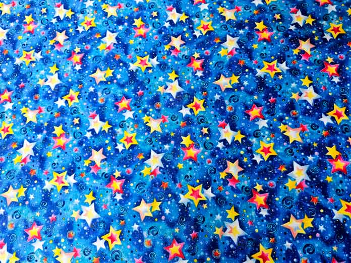 Red and yellow stars on blue fabric
