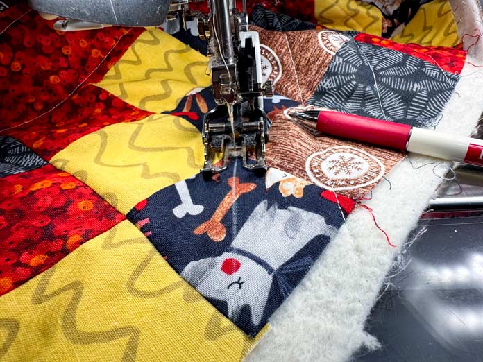 Quilting diagonal lines on the outer border.