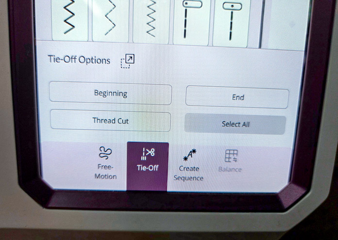 A screen on a computerized sewing machine; Husqvarna VIKING Designer Topaz 65