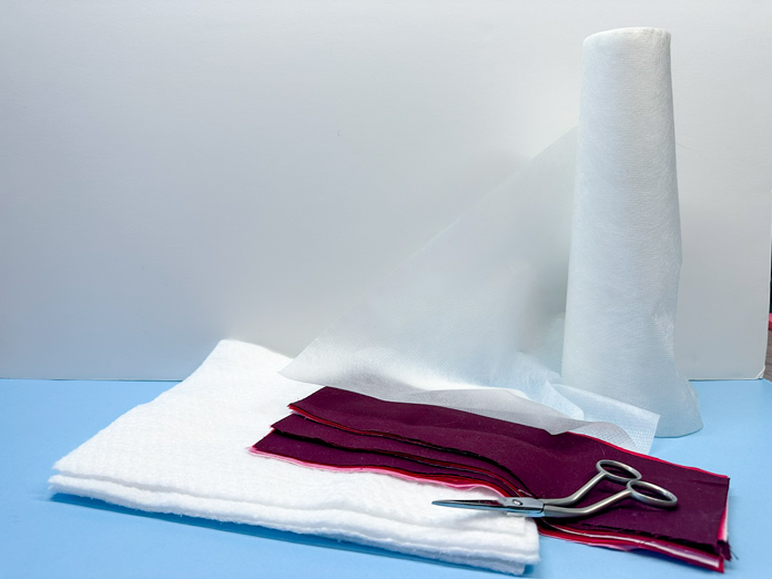 A picture of my assembled materials and tools for the creativate Endless Quilted Table Runner Project 