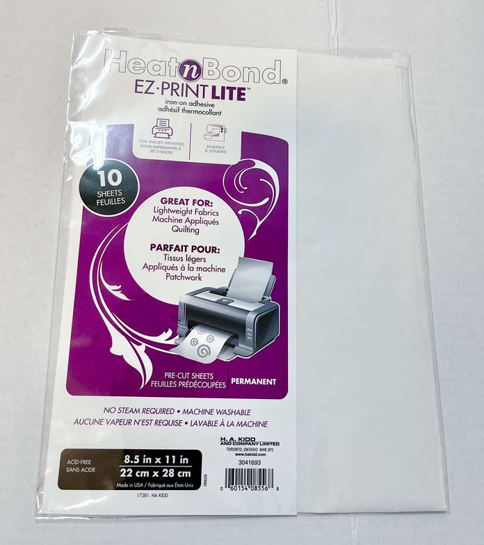 A picture of a package of HeatnBond EZ Print Lite iron–on adhesive sheets