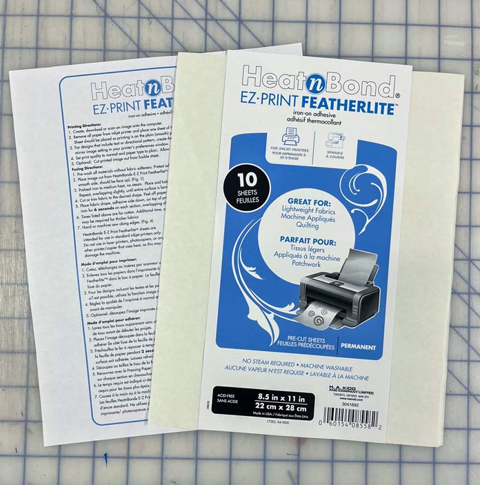 A package of HeatnBond EZ-Print Feather Lite sheets 8½" x 11" and the instructions for using them