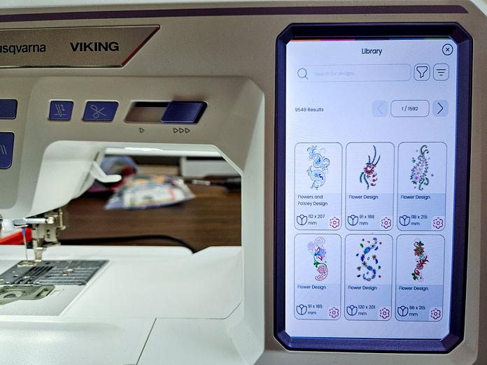 A screen on a computerized sewing and embroidery machine shows 6 embroidery designs from mySewnet Library; Husqvarna VIKING Designer Quartz 29, mySewnet Machine Embroidery Software, mySewnet Library, Husqvarna VIKING Tear-a-Way Light Stabilizer 15 Inches x 25 Yards