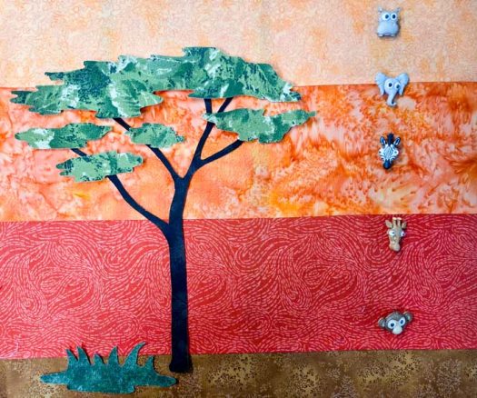 A tree on an orange striped background