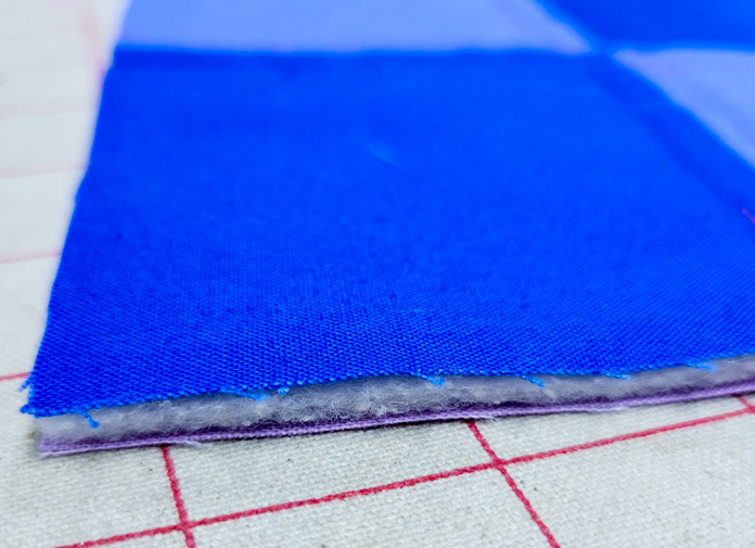 Blue and purple fabric with batting in between