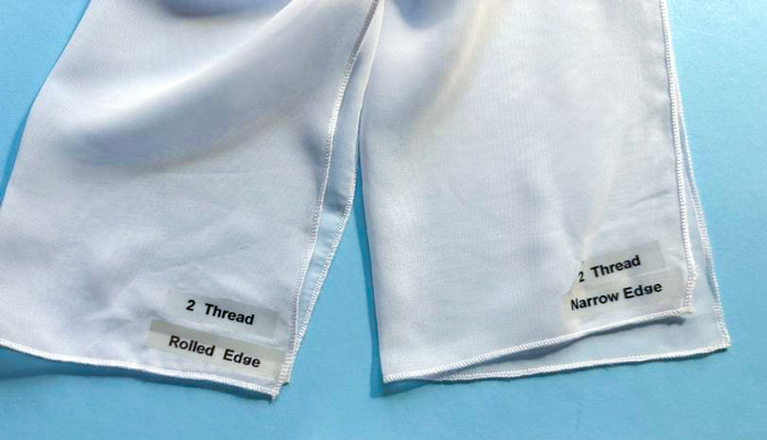 2 rectangular ends of white chiffon scarves showing the 2-thread rolled edge on the left, and the 2-thread narrow edge on the right. Both are labeled and are very similar delicate edge finishes. One is slightly wider than the other; PFAFF admire air 7000 serger 