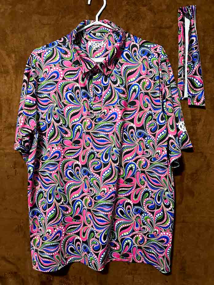 A vibrantly colored golf shirt, with a neat finished hem