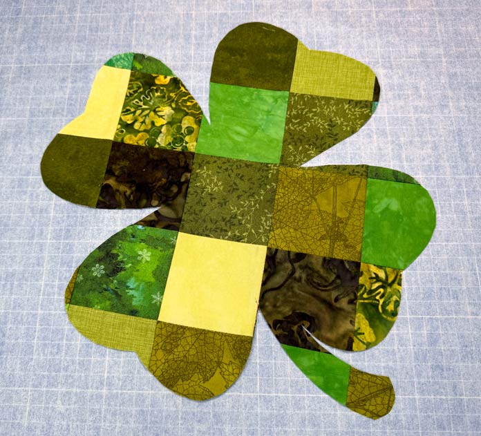 A four-leaf clover made of a 25-patch green block.