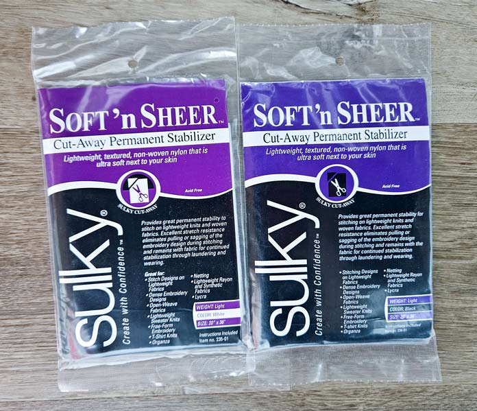 Two purple and black packaging options