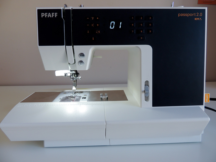 Front view of passport 2.0 sewing machine turned on with LED lights; unboxing the PFAFF passport 2.0