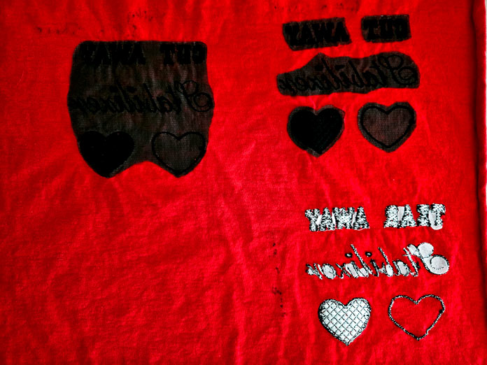 Black and white stabilizers on red fabric