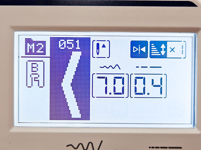 A screen on a computerized sewing machine