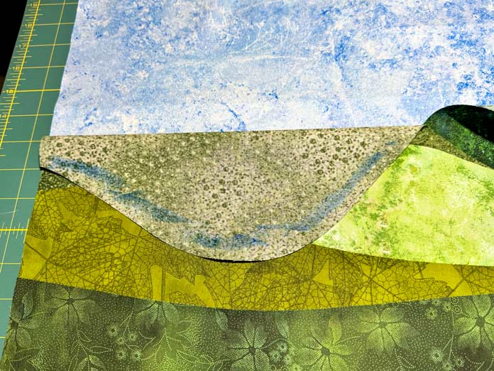 Odif 505 Temporary Adhesive Glue Stick applied to the back edge is a fabric. 