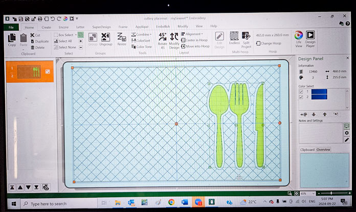 A computer screen with a graphic image showing diagonal crosshatch lines around the image of a green knife, fork, and spoon. Husqvarna VIKING DESIGNER EPIC 3 sewing and embroidery machine, Husqvarna VIKING 6in/15.2cm Applique Scissor, Husqvarna VIKING Open Toe Presser Foot for IDF System, Husqvarna VIKING Mega Turnable Hoop 450 mm x 450 mm, Husqvarna VIKING Tear-a-Way Extra Wide Stabilizer 24" x 10 Yards, Husqvarna VIKING Cut-a-Way Extra Wide Stabilizer 24” x 10 Yards, SULKY Slimline Metallic Dream Assortment