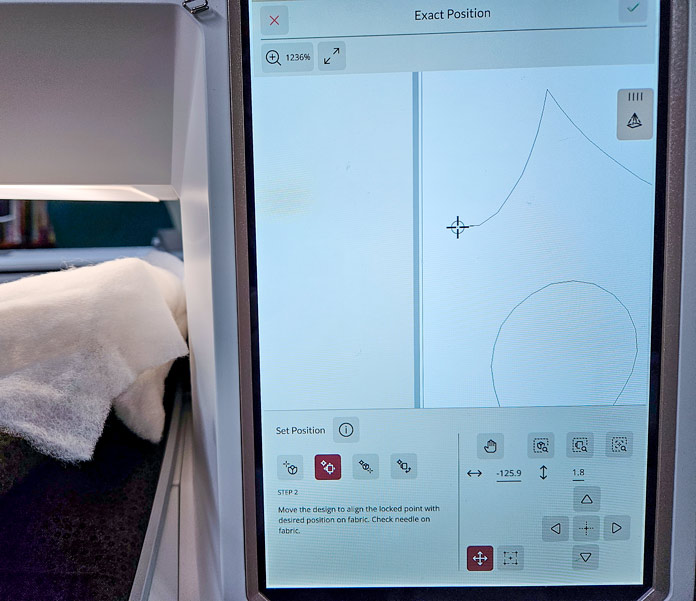 A screen on a computerized sewing machine showing the Exact Position tool. Husqvarna VIKING DESIGNER EPIC 3 sewing and embroidery machine, Husqvarna VIKING 6in/15.2cm Applique Scissor, Husqvarna VIKING Open Toe Presser Foot for IDF System, Husqvarna VIKING Mega Turnable Hoop 450 mm x 450 mm, Husqvarna VIKING Tear-a-Way Extra Wide Stabilizer 24" x 10 Yards, Husqvarna VIKING Cut-a-Way Extra Wide Stabilizer 24” x 10 Yards, SULKY Slimline Metallic Dream Assortment