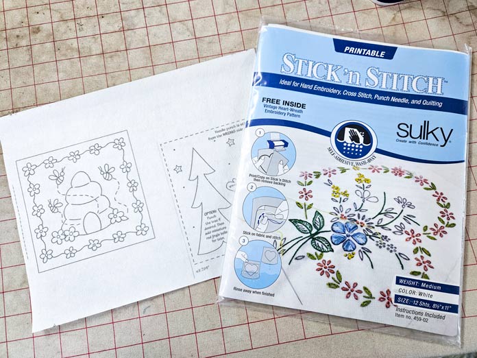 Blue and white packaging with a line drawing
