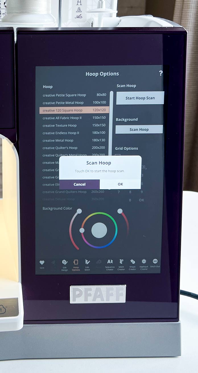 A purple model of the PFAFF creative icon 2 with a pop-up message with call to action message to attach the hoop