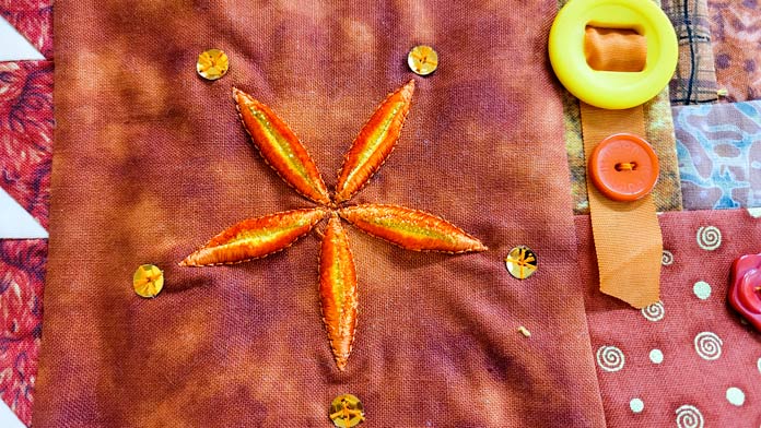 A five-pointed star on orange fabric