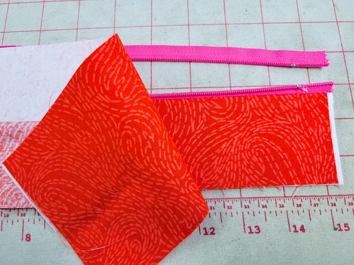 Orange fabric with a pink zipper; making a project bag on the Husqvarna VIKING ONYX 25