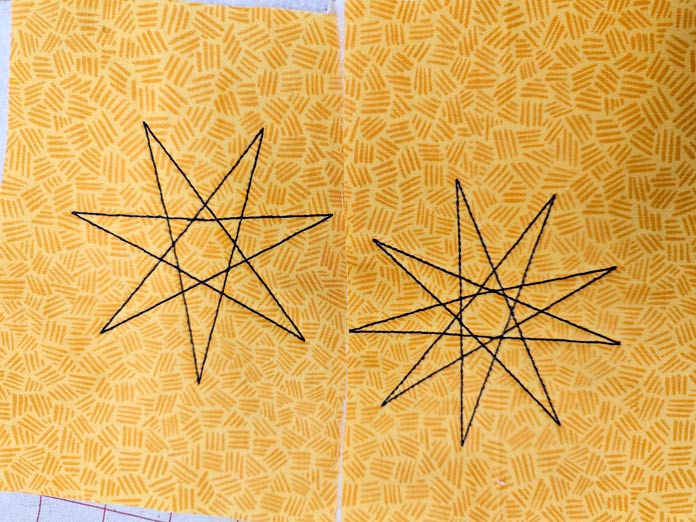 Two complex star outlines on yellow fabric