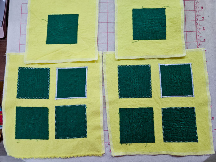 Green squares on yellow fabric; HeatnBond, fusible web, sewing, applique, quilting, hemming, fabric adhesive, SoftStretch, Lite, Featherlite, Ultra, sewing tips, crafting, fabric experiments