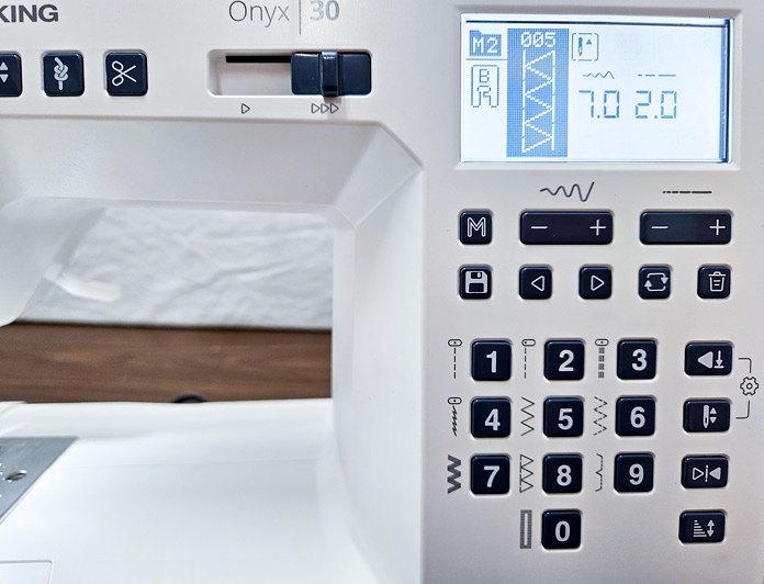A screen on a computerized sewing machine