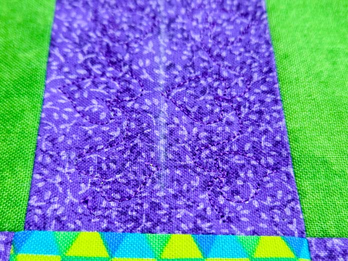 Purple stitches on purple fabric; Creativate Embroidery Software