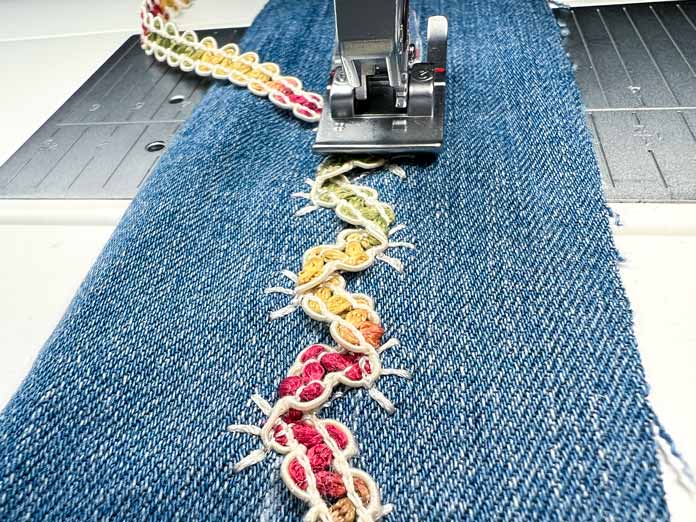 Back view of the 2A Fancy Stitch Foot on the PFAFF creative icon 2, showing how the ribbon is formed using Single Ribbon Stitch #8.1.8 on denim.