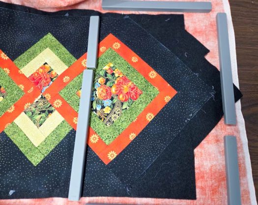 A black and green table runner with rectangular magnets