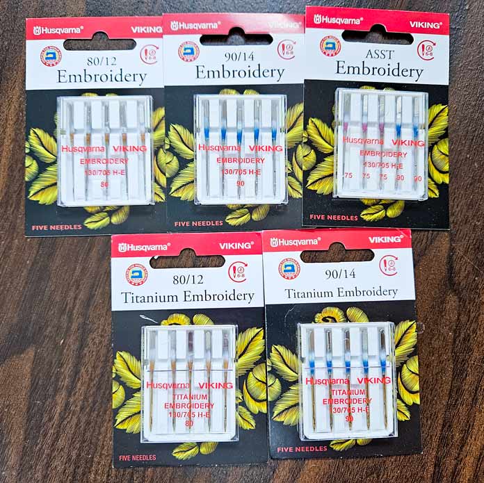 Five packages of embroidery machine needles; machine embroidery, embroidery tools, embroidery supplies, quilting, Husqvarna VIKING, embroidery hoops, stabilizers, sewing machine, embroidery techniques, QUILTsocial, Designer Epic 3