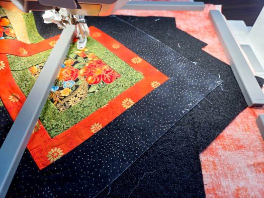 A black and green table runner with rectangular magnets