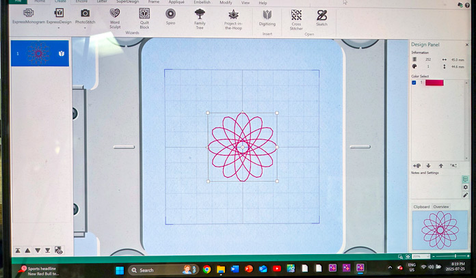 A computer screen with a red motif; Creativate Embroidery Software