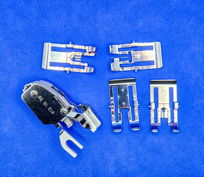 A walking foot for a sewing machine with four different presser feet
